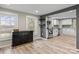 Well-lit home office connected to the updated kitchen with new wood-look flooring at 98 Ring Sw Ave, Concord, NC 28025