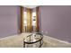 Bedroom featuring an oval glass coffee table and natural light at 10605 Three Rivers Ct, Charlotte, NC 28273