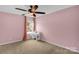 Bedroom with ceiling fan and natural light from the window at 10605 Three Rivers Ct, Charlotte, NC 28273