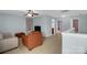 This bonus room features a comfy leather chair and light blue walls at 10605 Three Rivers Ct, Charlotte, NC 28273