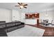 Spacious living room open to kitchen features hardwood floors and stainless steel appliances at 10605 Three Rivers Ct, Charlotte, NC 28273
