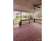 Inviting covered back porch with a ceiling fan, perfect for relaxing or entertaining outdoors at 10607 Old Bridge Ln, Charlotte, NC 28269