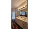 Bathroom with double vanity, soaking tub, and walk-in shower at 10607 Old Bridge Ln, Charlotte, NC 28269