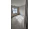 Bright bedroom with carpet flooring, and a window providing natural light at 10607 Old Bridge Ln, Charlotte, NC 28269