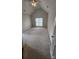 A spacious bedroom with a vaulted ceiling and large window at 10607 Old Bridge Ln, Charlotte, NC 28269