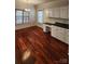 Bright dining area featuring wood floors and built-in cabinets at 10607 Old Bridge Ln, Charlotte, NC 28269