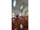 An open living room featuring wood floors, fireplace, and natural light at 10607 Old Bridge Ln, Charlotte, NC 28269