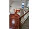 Open floor plan showcasing living room and stairs with hardwood floors and natural light at 10607 Old Bridge Ln, Charlotte, NC 28269