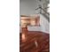 View from the living room into the open kitchen and staircase to the second floor at 10607 Old Bridge Ln, Charlotte, NC 28269
