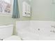 The bathroom features a soaking tub for a relaxing and spa-like experience at 10820 Hunters Trace Ct, Charlotte, NC 28262