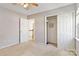 Simple bedroom featuring a ceiling fan and closet at 10820 Hunters Trace Ct, Charlotte, NC 28262