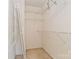 Walk-in closet with white shelving units ready for storage and organization at 10820 Hunters Trace Ct, Charlotte, NC 28262