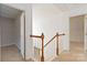 A brightly lit hallway with access to multiple rooms at 10820 Hunters Trace Ct, Charlotte, NC 28262