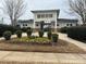 Well-maintained community center with landscaped flowerbeds and a welcoming entrance at 10933 Sedgemoor E Ln, Charlotte, NC 28277