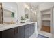 Luxurious bathroom featuring double vanity sinks, modern fixtures, and a glass-enclosed shower for relaxation at 1210 Skyview Rd, Charlotte, NC 28208