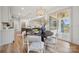 Open-concept dining area with sliding doors to the outdoor patio at 1210 Skyview Rd, Charlotte, NC 28208