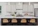 Spacious kitchen island featuring pendant lighting and modern finishes at 1210 Skyview Rd, Charlotte, NC 28208