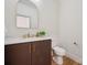 Stylish powder room featuring modern fixtures, a marble countertop and clean design at 1210 Skyview Rd, Charlotte, NC 28208