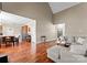 Open-concept living room showcases wood floors and inviting space perfect for entertaining at 134 Falling Leaf Ln, Statesville, NC 28677