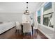 Charming dining area with chandelier lighting and view of the living space at 13925 Helen Benson Blvd, Davidson, NC 28036