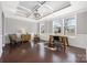 Bright office with coffered ceilings, hardwood floors, large windows, and decorative trim at 13925 Helen Benson Blvd, Davidson, NC 28036
