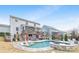 Beautiful backyard with swimming pool, spa, and outdoor kitchen, perfect for entertaining at 14130 Sunnyhill Grove Rd, Davidson, NC 28036