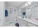 Bathroom with double sink vanity and tiled shower/tub at 14130 Sunnyhill Grove Rd, Davidson, NC 28036