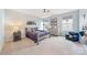 Cozy bedroom with a full size bed, dresser, and accent chair at 14130 Sunnyhill Grove Rd, Davidson, NC 28036