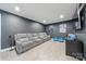 Comfortable media room features plush seating, movie posters, and a mounted television at 14130 Sunnyhill Grove Rd, Davidson, NC 28036