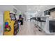 Finished basement with a bar, video games, and seating, perfect for entertaining guests at 14130 Sunnyhill Grove Rd, Davidson, NC 28036