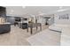 Large recreation room with a foosball table, gaming machines, a wet bar, and a lounge area at 14130 Sunnyhill Grove Rd, Davidson, NC 28036