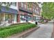 Vibrant commercial district featuring modern storefronts and outdoor seating along a pedestrian-friendly street at 142 Mills Ln, Fort Mill, SC 29708