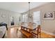 Dining room features natural light, neutral walls, and hardwood flooring at 142 Mills Ln, Fort Mill, SC 29708