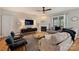 Living room with fireplace, TV, and hardwood flooring at 142 Mills Ln, Fort Mill, SC 29708