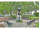 Charming town square featuring a clock tower, benches, and lush green landscaping at 142 Mills Ln, Fort Mill, SC 29708