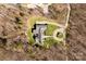 Aerial view of the home showing an ample front lawn, driveway, and surrounding forest at 1426 Merrimont Ave, Kings Mountain, NC 28086