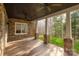 Stone back porch with wooden ceiling, stone columns, and outdoor view at 1426 Merrimont Ave, Kings Mountain, NC 28086