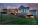 Back exterior view of the home at dusk at 1426 Merrimont Ave, Kings Mountain, NC 28086