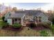 Back exterior view of the home featuring an outdoor dining area at 1426 Merrimont Ave, Kings Mountain, NC 28086