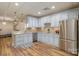 Basement kitchen with granite countertops, stainless steel appliances, and tile backsplash at 1426 Merrimont Ave, Kings Mountain, NC 28086