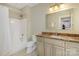 Bathroom featuring a marble counter top, white shower and white toilet at 1426 Merrimont Ave, Kings Mountain, NC 28086