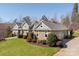 Beautiful home features professional landscaping, stone accents and a three-car garage at 1426 Merrimont Ave, Kings Mountain, NC 28086