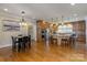 Spacious kitchen with stainless steel appliances, a center island, and hardwood floors at 1426 Merrimont Ave, Kings Mountain, NC 28086