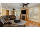 Comfortable living room with a fireplace, built-in shelving, and plush seating for relaxation at 1426 Merrimont Ave, Kings Mountain, NC 28086