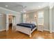Spacious main bedroom boasts hardwood floors, natural light, and ensuite at 1426 Merrimont Ave, Kings Mountain, NC 28086