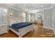 Spacious main bedroom boasts hardwood floors, natural light, and neutral paint at 1426 Merrimont Ave, Kings Mountain, NC 28086