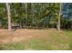 Backyard view with mature trees at 1513 Fletcher Broome Rd, Monroe, NC 28112
