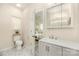 Bathroom with a single vanity and a view into the main bedroom at 1513 Fletcher Broome Rd, Monroe, NC 28112