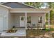 Inviting front porch with cozy seating and decorative plants, creating a warm welcome to this charming home at 1513 Fletcher Broome Rd, Monroe, NC 28112