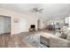 Open concept living room, dining area, and kitchen with continuous flooring and neutral paint at 1513 Fletcher Broome Rd, Monroe, NC 28112